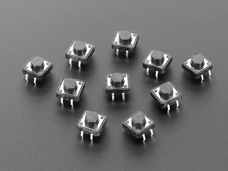 The 12 mm tactile switch that each module uses.